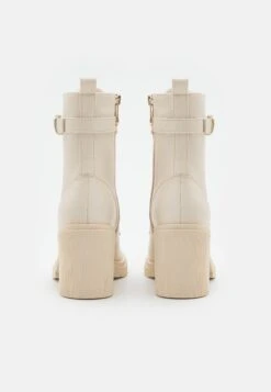 Marco Tozzi Stivaletti Con PlateauCream/Gold Donna Stivaletti M3111N120-A11 -Vendite Scarpe Donna 32980b238b194b4aae99815c437de51c