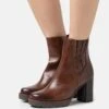 Marco Tozzi Stivaletti Con PlateauChestnut Donna Stivaletti M3111N118-O11 -Vendite Scarpe Donna 4bd434abb74a4e92bd9b3895d9b7771a