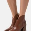 Marco Tozzi StivalettiCognac Donna Stivali M3111N12S-O11 2 Marco Tozzi StivalettiCognac Donna Stivali M3111N12S-O11 -Vendite Scarpe Donna 51a5e49360fc4070aa079c01088fedd6