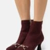 Marco Tozzi StivalettiBordeaux Donna Stivaletti M3111N10T-G11 -Vendite Scarpe Donna 59e60e52f2034c7d89c463e53a56ac49
