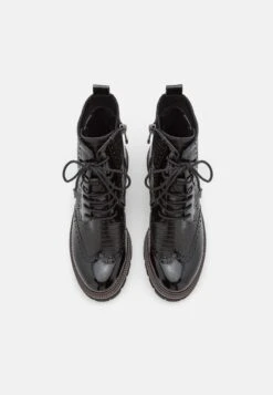 Marco Tozzi Stivaletti StringatiBlack Donna Stivaletti M3111N12G-Q11 -Vendite Scarpe Donna d957673150fe4138927de2e9c2e75212