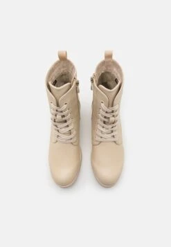 Marco Tozzi Stivaletti Con PlateauCream Donna Stivaletti M3111N10O-A11 -Vendite Scarpe Donna e56f7c4f8d9c47878695f847f8c7daac